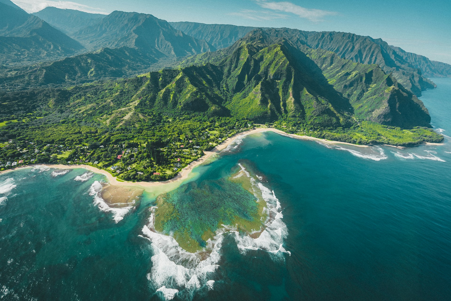 Aerial View of Stunning Sea with Lush Green Mountain Ranges