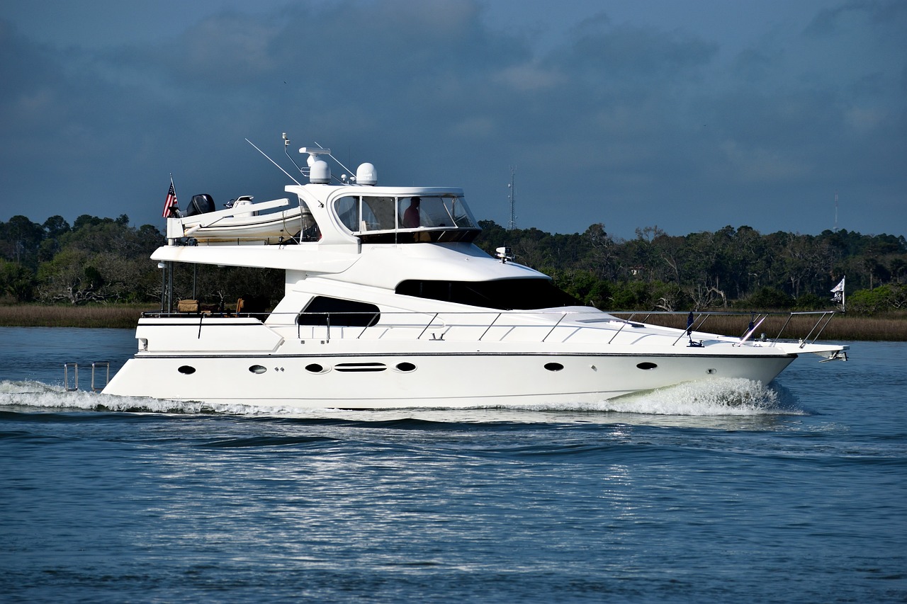 White Yacht Sailing on the Blue Sea