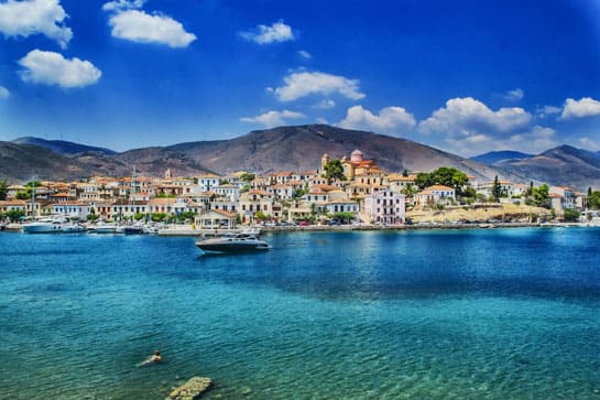 A ship docked at a Mediterranean port