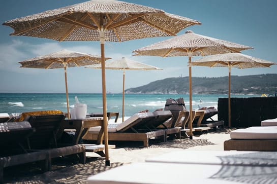 Saint-Tropez beach with umbrellas and lounge chairs
